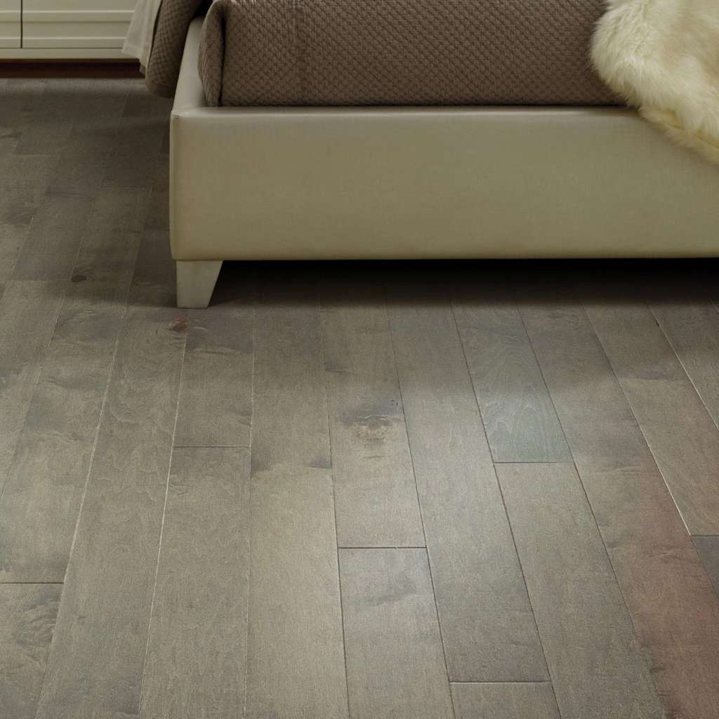 Eclectic Maple by Shaw Floors highlights maple's natural beauty and character with smooth texture and low-gloss sheen. Pillowed edges and ends give each plank a more pronounced sculpted effect which enhances the versatile vintage look