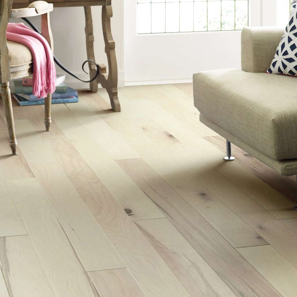 Eclectic Maple by Shaw Floors highlights maple's natural beauty and character with smooth texture and low-gloss sheen. Pillowed edges and ends give each plank a more pronounced sculpted effect which enhances the versatile vintage look