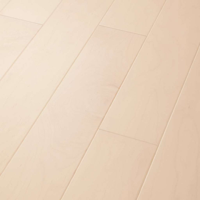 Eclectic Maple by Shaw Floors highlights maple's natural beauty and character with smooth texture and low-gloss sheen. Pillowed edges and ends give each plank a more pronounced sculpted effect which enhances the versatile vintage look
