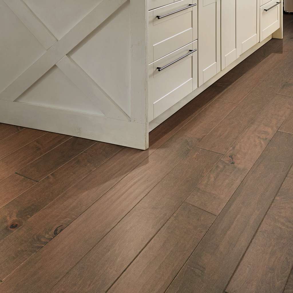 Subtle scraped maple flooring in bold, rich colors. Also available in a smooth surface version, Ocala.