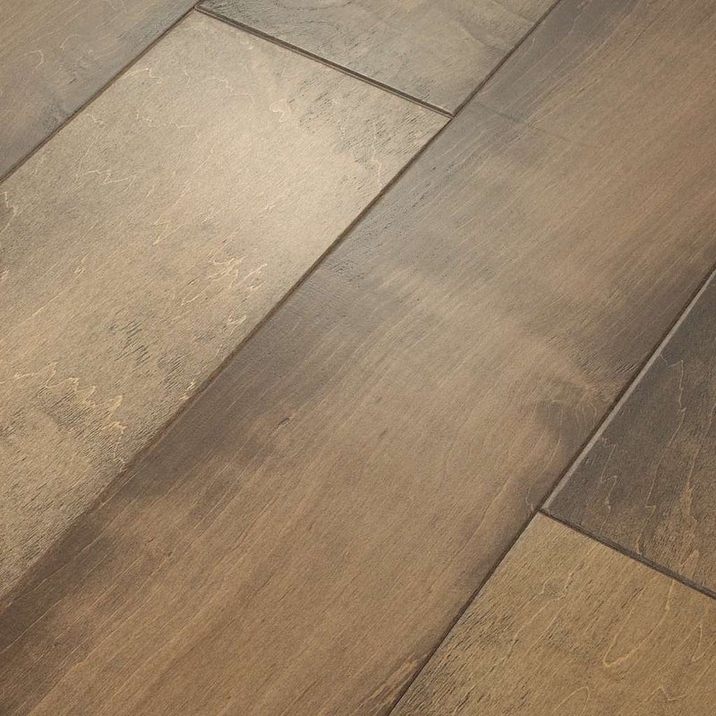 A note from our designers: with a smooth and imperfect surface texture, Monument Maple is a masterful composition full of depth and color that transcends timeless beauty. Shaw Floors' exclusive antiquing process emulates the unique complexity of an authentic timeworn surface. Our multi-colored staining process captures the visual tapestry with movement and dimension.