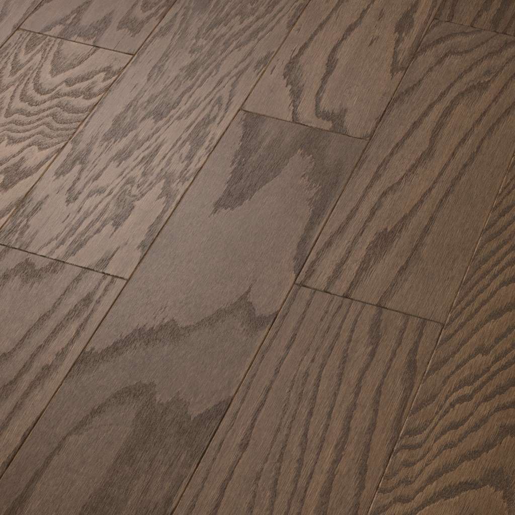 Eclectic Oak by Shaw Floors features the distinctive graining and detail of red oak hardwood. Pillowed edges and ends give each plank a more pronounced sculpted effect, which enhances the versatile vintage look.