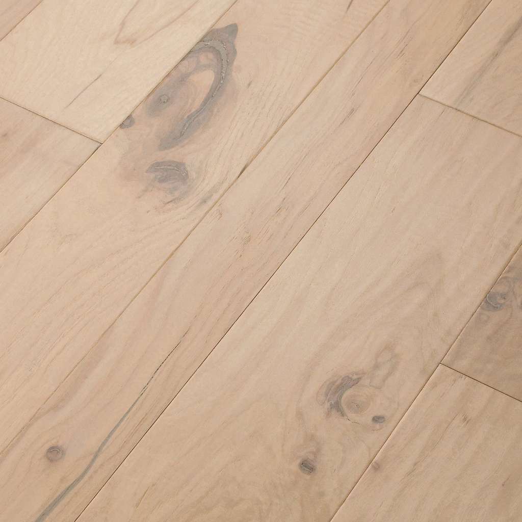 Light, natural tones and visible knots and splits create an unrefined look that illustrates the beauty of wood’s imperfection.