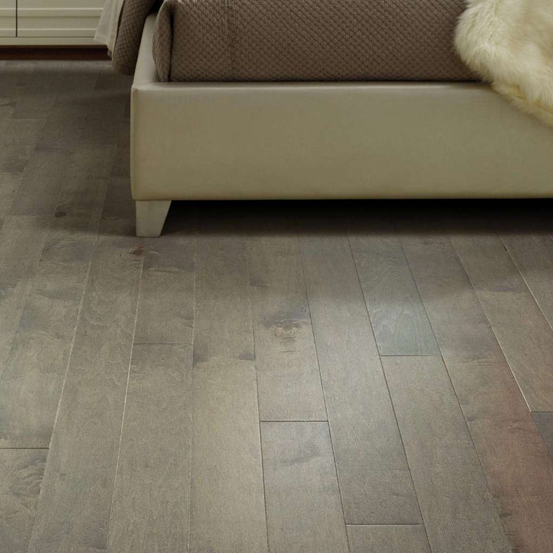Eclectic Maple by Shaw Floors highlights maple's natural beauty and character with smooth texture and low-gloss sheen. Pillowed edges and ends give each plank a more pronounced sculpted effect which enhances the versatile vintage look   