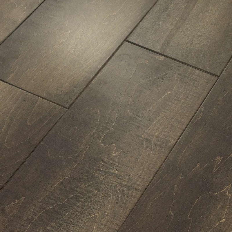 A note from our designers: with a smooth and imperfect surface texture, Monument Maple is a masterful composition full of depth and color that transcends timeless beauty. Shaw Floors' exclusive antiquing process emulates the unique complexity of an authentic timeworn surface. Our multi-colored staining process captures the visual tapestry with movement and dimension.