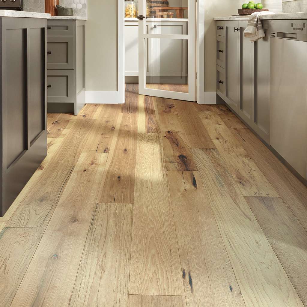 Part of the Gallery Collection of premium hardwood, Empire Oak is hand selected by design experts to bring the natural artistry of hardwood into your home. The clean look and understated finishes let the beauty of the wood shine through for a timeless look that ages gracefully.