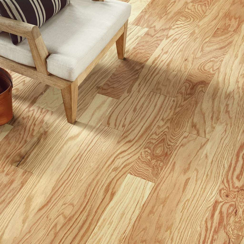 Timeless Oak 5" by Shaw Floors features red oak hardwood at its finest. With distinctive graining, these planks are sure to make a bold statement on the floor.