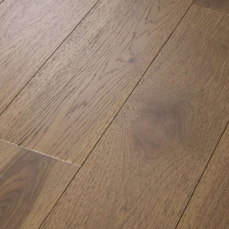 The Castlewood collection has an abundance of the natural charm that makes hardwood floors so desirable. Creating its stunning character are stylish 7 1/2" widths, extremely handsome linear graining, and sawn face veneers that closely resemble solid hardwood.