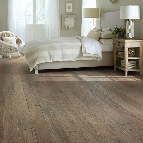 Pebble Hill Hickory, which warms rooms with its rich grain and hand-scraped texture, has proven so popular we've added another width plus three new colors. Hickory has inherent strength and durability, which make Pebble Hill a fantastic flooring choice. Made in the USA.