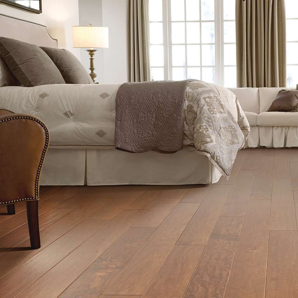 Subtle scraped maple flooring in bold, rich colors. Also available in a smooth surface version, Ocala.