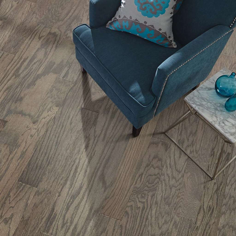 Timeless Oak 5" by Shaw Floors features red oak hardwood at its finest. With distinctive graining, these planks are sure to make a bold statement on the floor.
